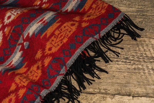INDI ROT ORANGE Decke mit Fransen | Plaid aus recycelter Wolle